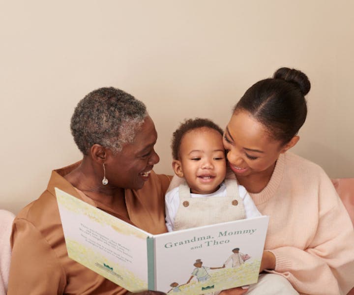 Grandma, mother and child reading